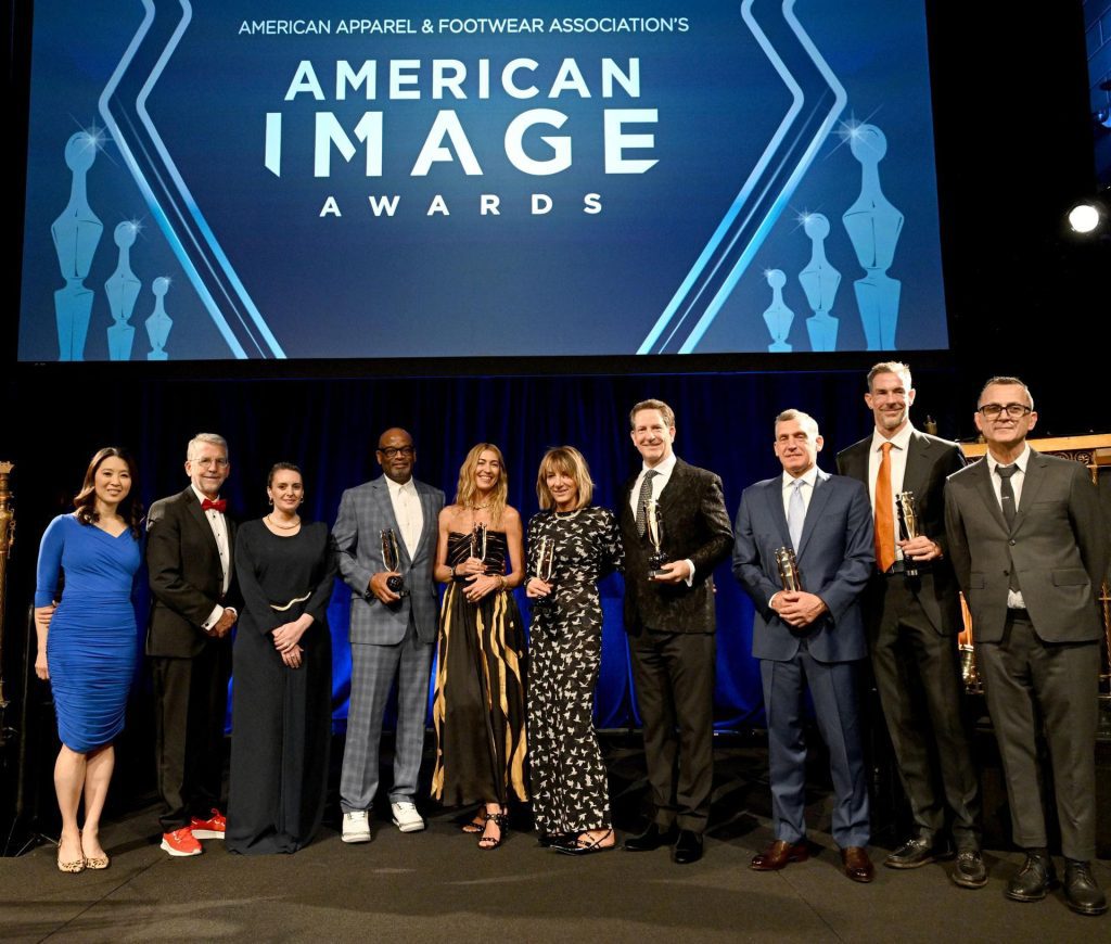 The 2025 AAFA American Image Awards honoree slate (l. to r.):  Scarlet Fu, emcee, Steve Lamar of AAFA, Laura Weber of LW Pearl, Dr. D'Wayne Edwards of the Pensole Lewis College, Ulla Johnson, Katherine Gold of GoldBug, Bill Foudy of Target, Lance Ruttenberg of American Textiles, Lewis Perkins of the Apparel Impact Institute (Aii), and Steven Kolb of CFDA
